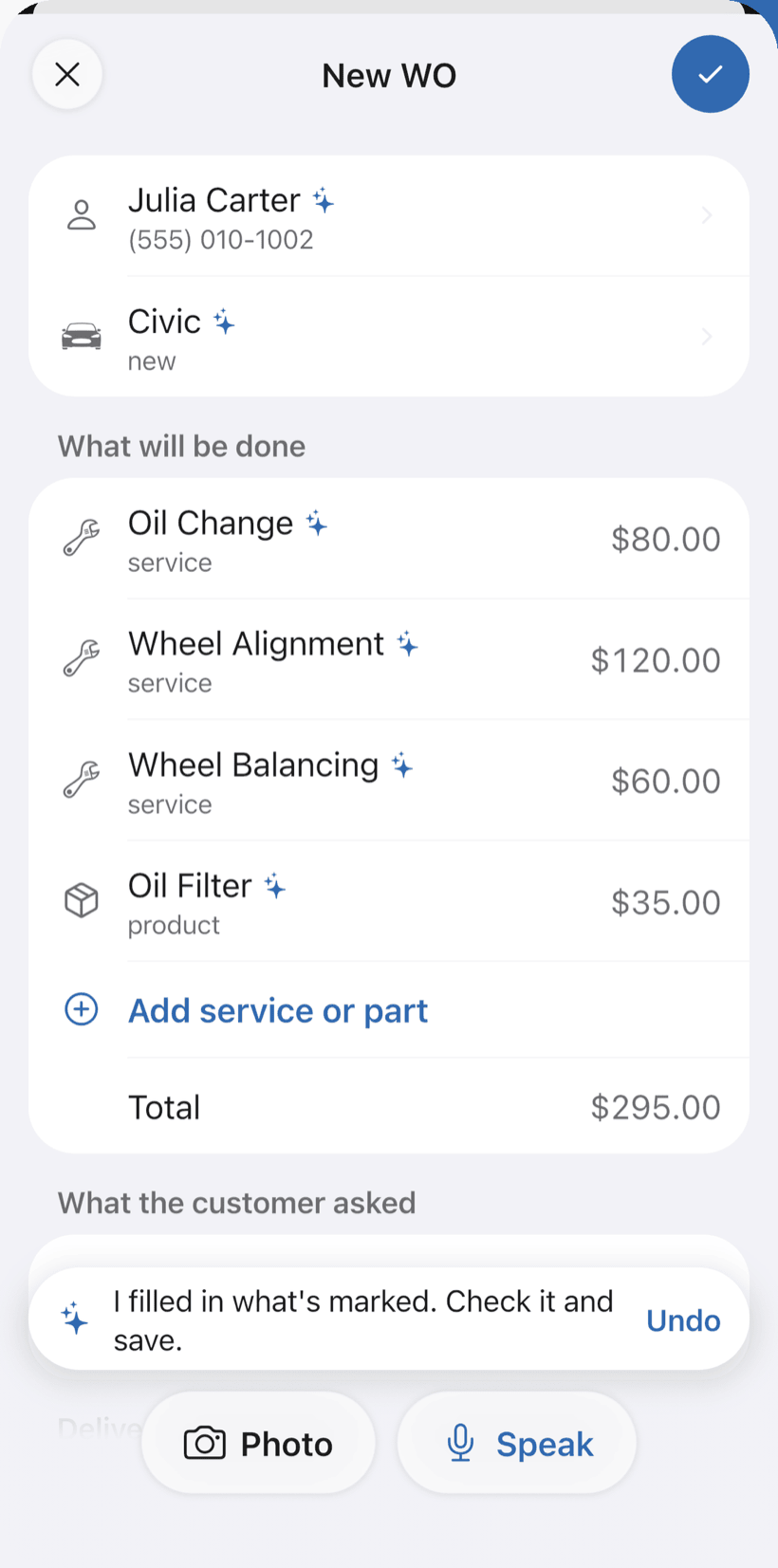 New work order filled in by the AI assistant, with customer, vehicle and services marked