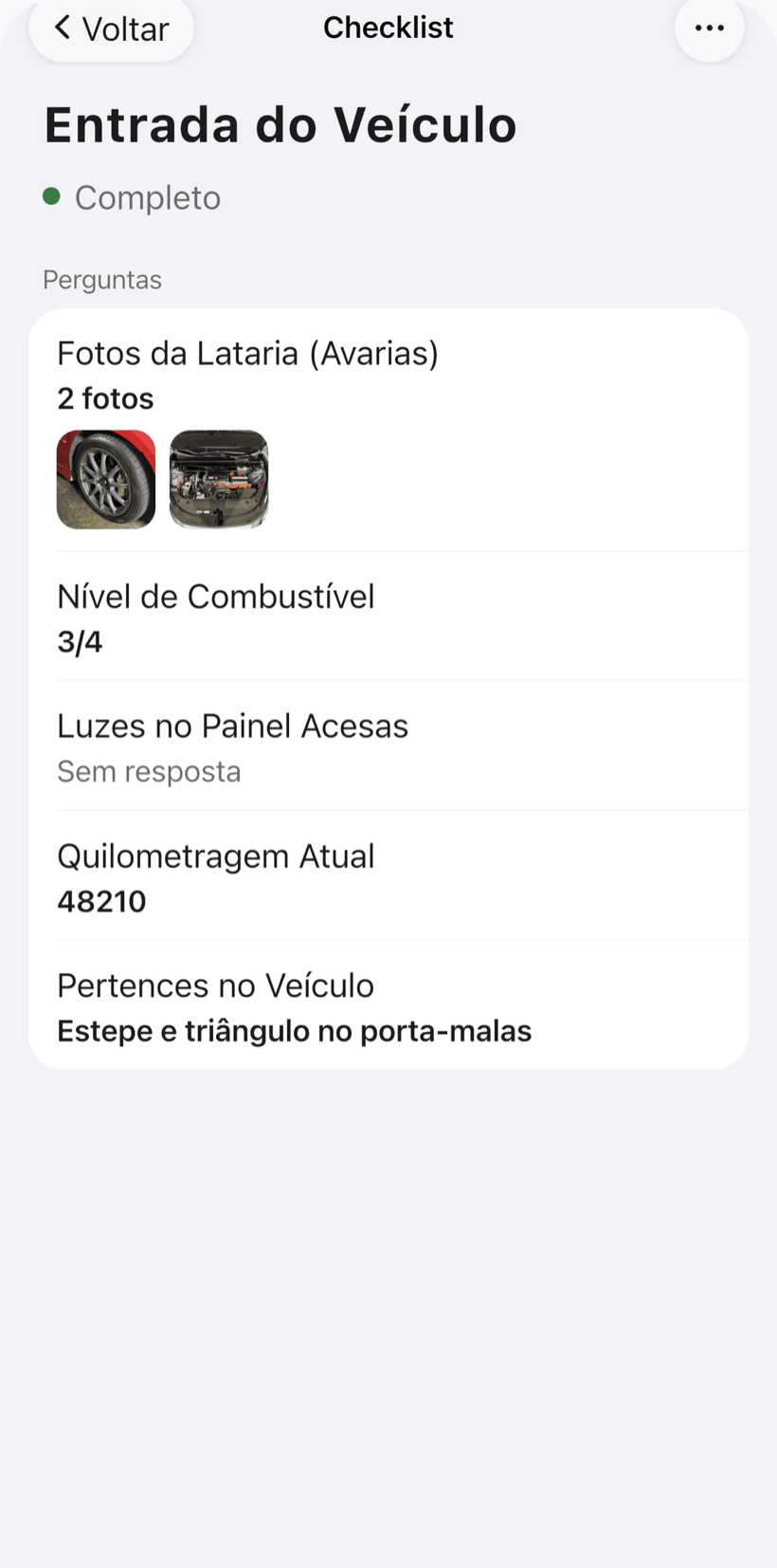Checklist de entrada preenchido com fotos das avarias
